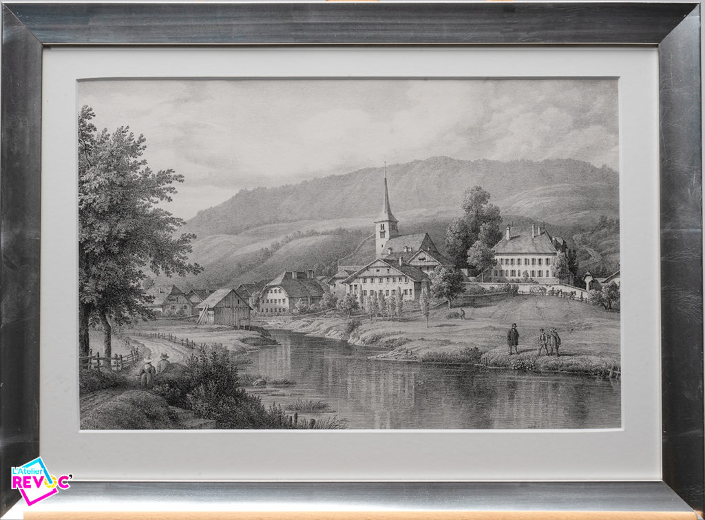 Ancienne gravure nettoyée avec cadre bois recouvert de feuille d'argent